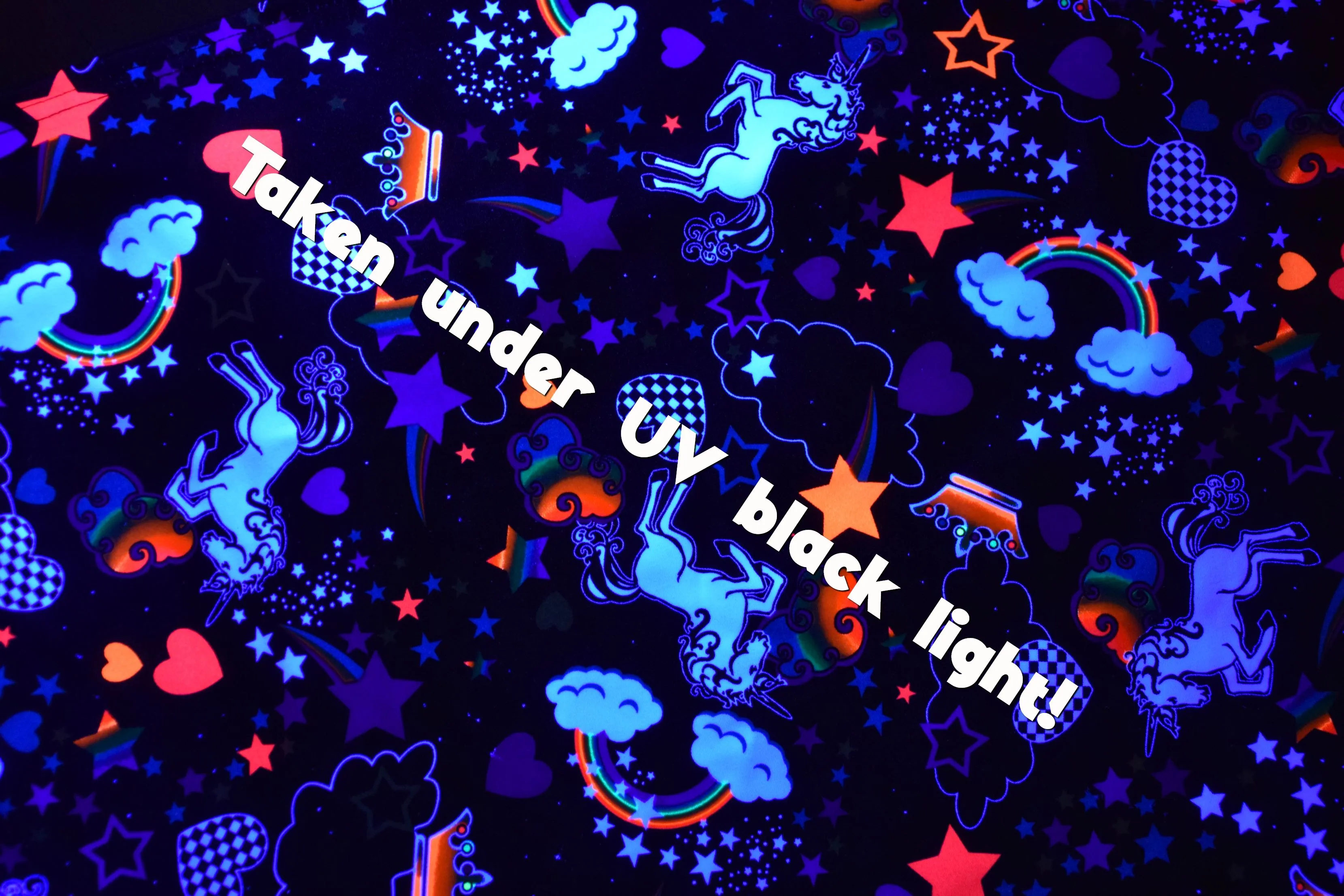 UV Glow Unicorns and Rainbows Fabric